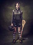 Young comogie player in match gear at Cormac Byrne Photography, Limerick, Ireland.  